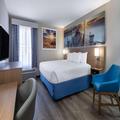 Photo of Days Inn & Suites by Wyndham Commerce