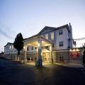 Exterior of Host Inn All Suites Hotel