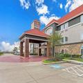 Exterior of La Quinta Inn & Suites by Wyndham Bridge City
