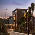Exterior of La Quinta Inn & Suites by Wyndham Orlando Idrive Theme Parks