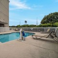Swimming pool at Country Inn & Suites by Radisson Goldsboro Nc