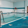 Swimming pool at Days Inn by Wyndham Flint/Bishop International Airport