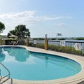 Swimming pool at Holiday Inn Express Hotel & Suites Tampa Rocky Point Island by Ih