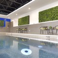 Swimming pool at Holiday Inn Express & Suites Vaudreuil An Ihg Hotel