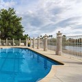 Swimming pool at La Quinta Inn & Suites by Wyndham Bonita Springs Naples N.