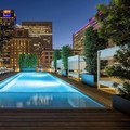 Swimming pool at The Laura Hotel Houston Downtown Autograph Collection