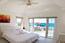 Master Bedroom With California King Bed & Ocean View 1 of 30